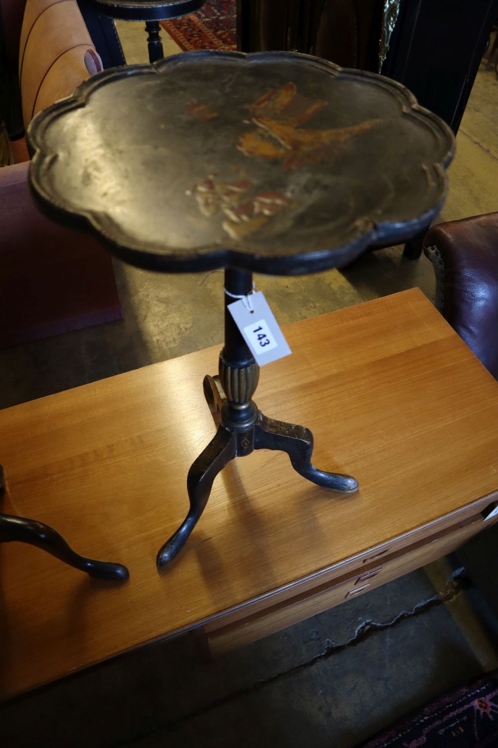 A 1920s chinoiserie lacquer tripod table, height 54cm and three others